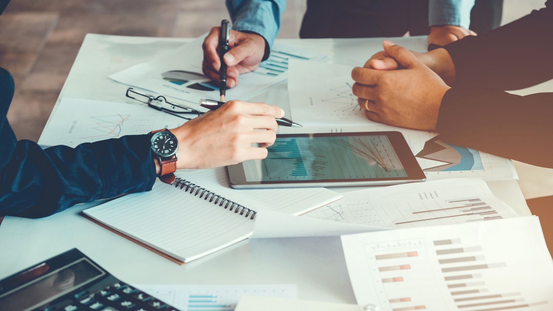 A business team in conference about estate planning